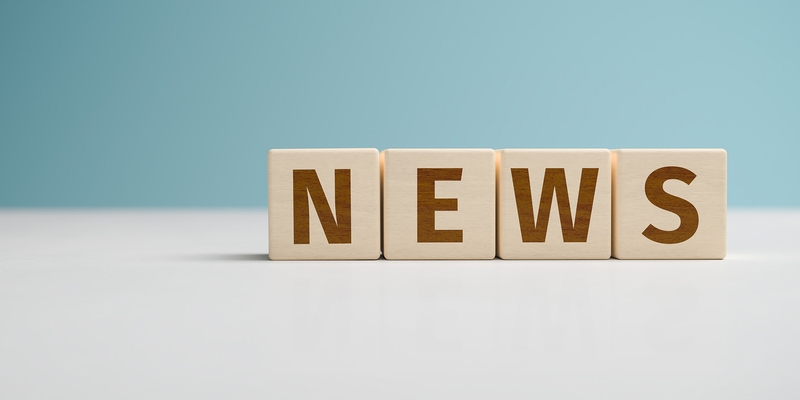 Wooden letters spell "NEWS" on a light background, perfect for sleep and comfort updates.